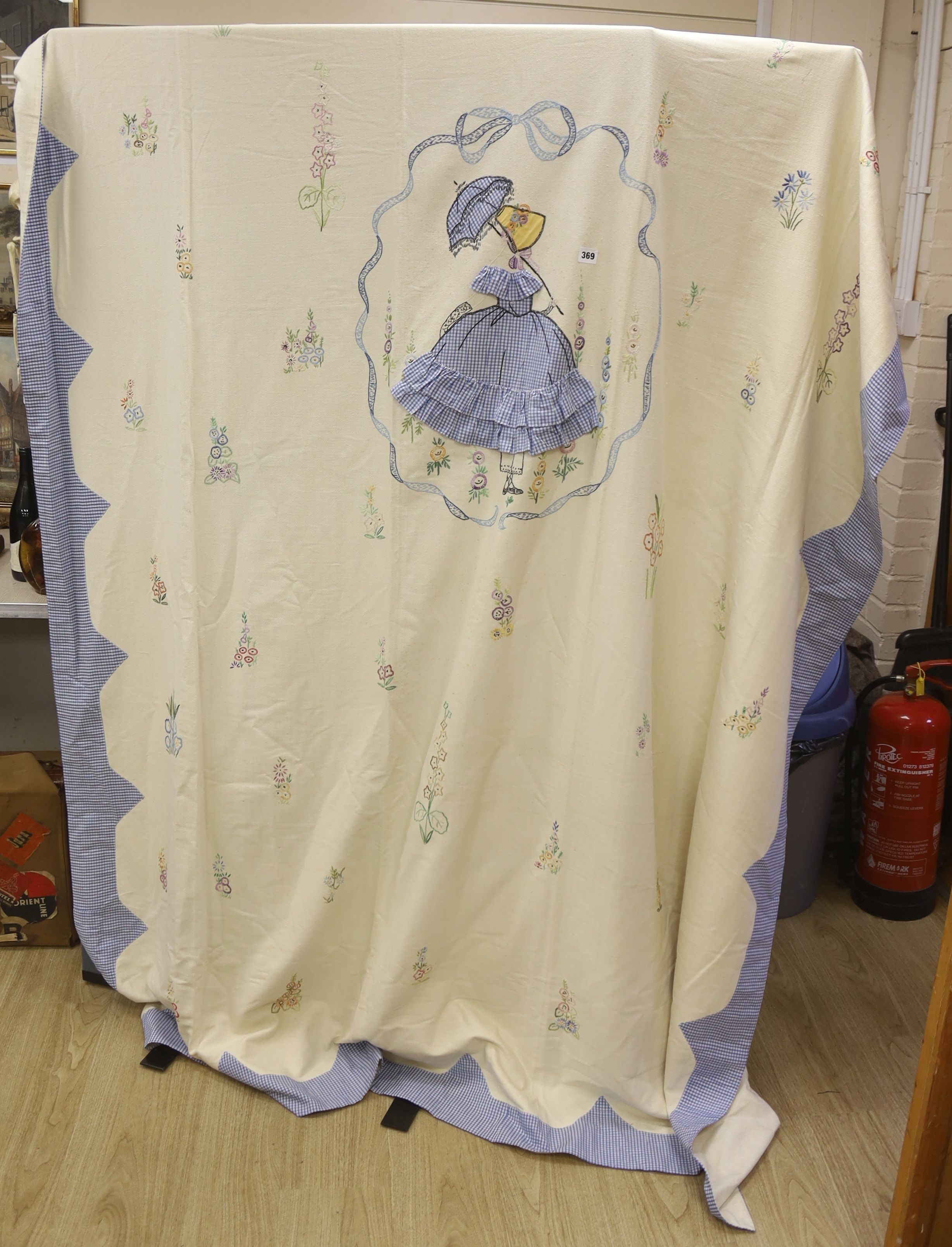 Two embroidered and appliquéd bed covers designed with ladies wearing crinoline dresses